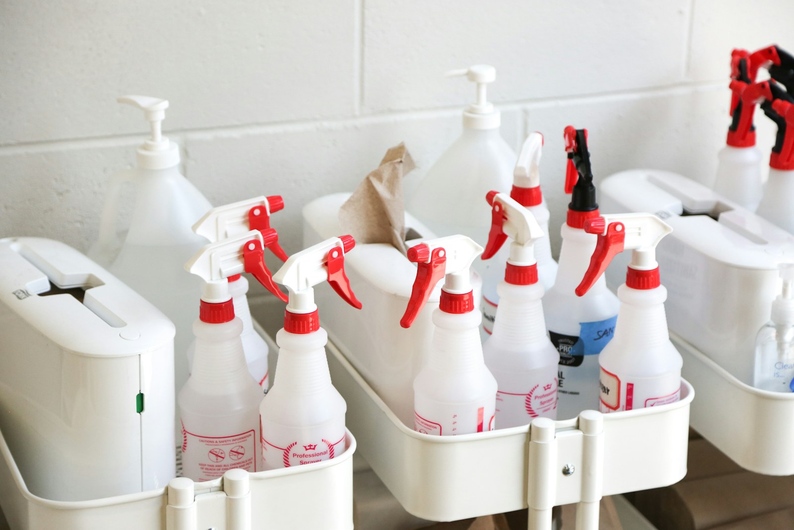 Cleaning caddy loaded with spray bottles, ready to go
